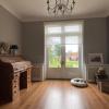 woonkamer met zicht op tuin